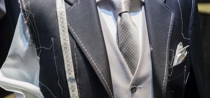 Suit jacket and necktie ready for a fitting appointment
